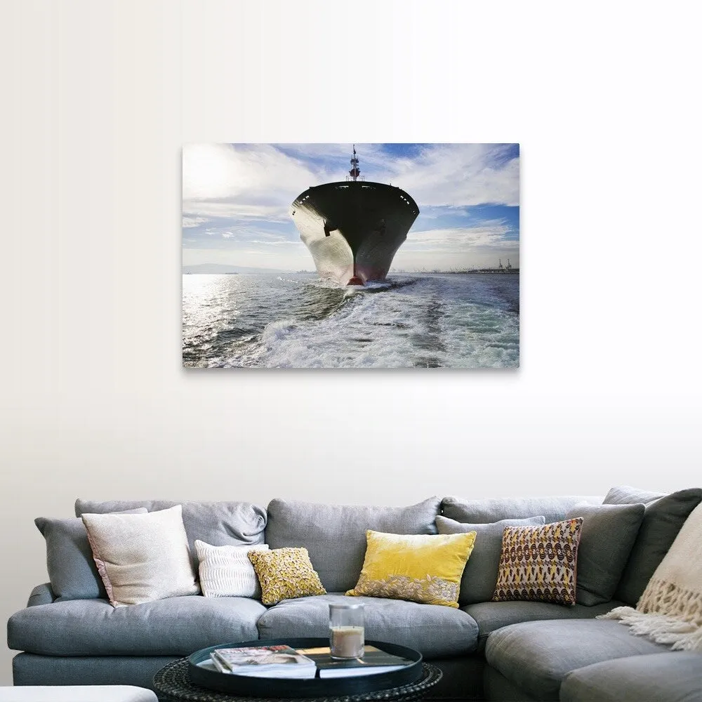 "Bow view of cargo ship sailing out of port." Canvas Wall Art